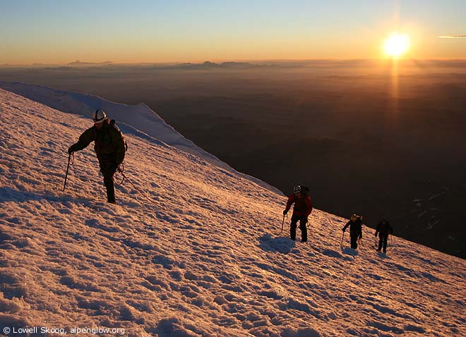 Sunrise near 13,500 feet on Mt Rainier.