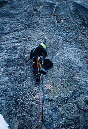 Alasdair Turner aiding the first crack pitch on Serpentine Arête on Dragontail Peak