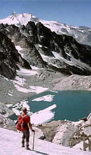 Triad lake was found glacial and barren of fish when surveyed after traversing from Buck Mtn. 1961 photo by Mike Swayne.