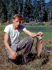 Mike Swayne with Twin Lake cutthroat planted by Trail Blazers, 1960. Photo by George Kniert.