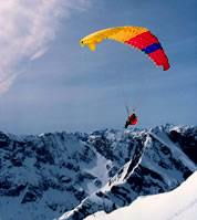 Lowell Skoog flying on skis from Blue Lake Peak. © Carl Skoog 