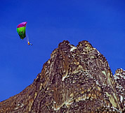 Lowell Skoog flying near Cutthroat Peak. © Carl Skoog  