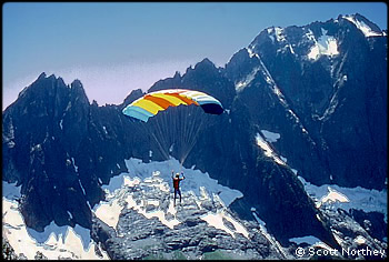 Scott Northey flying from Sahale Arm in 1987. Photo by Mary Bellue.