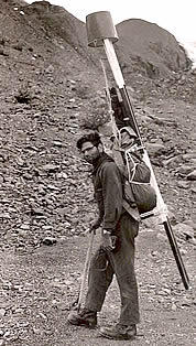 Austin S. Post, field leader, with pack load of equipment, starting up Worthington Glacier, July 1957. IGY 4.11. C Suzanne Brown, Personal Collection