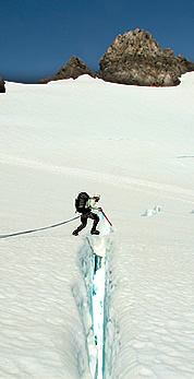 Doug jumping a crevasse on the Blue Glacier.  © Steph Abegg  