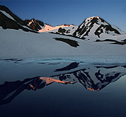 Lake reflection, Bailey Range. © Steph Abegg. 