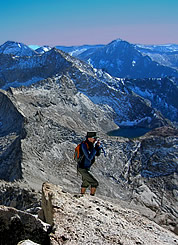 Steven Sheets photographing a Sierra summit scene. © Leor Pantilat. 