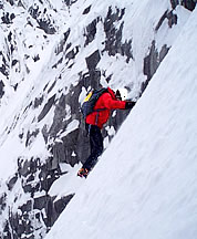 Dylan Johnson climbing the LKM route on Stuart. Photo © Colin Haley.