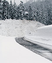 Thirty feet of debris from a control avalanche across the highway at Tunnel Creek near Stevens Pass, February 9, 2008. Photo © Mike Stanford.