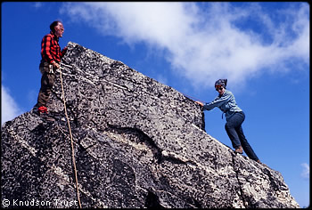 Joe and Carla Firey climbing on Austera Ridge, 1969. Photo © Knudson Photographic Trust.