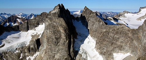 Aerial view of Mox Peaks (Twin Spires) from the NE. Photo © John Scurlock.