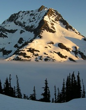 Jack Mountain at sunrise.  The South Face is in shadow. Photo © Sky Sjue.