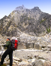 Blake Herrington below the Tempest Wall, Colchuck Balanced Rock.  Photo © Sol Wertkin.