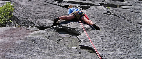 Bill Enger starting up the 5.8 cracks of pitch 18. Photo © David Whitelaw