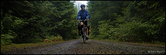 John Mauro bicycling toward the Cascade Mountains. Photo © John Mauro.