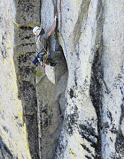 Sol Wertkin nears the big roof on pitch 7 (5.11a), “Dragons of Eden.” Photo © Max Hasson.