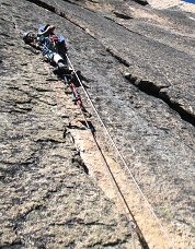 Aiding the “Cracks to the Future.” The free route ultimately went farther left. Photo © Erik Lawson.