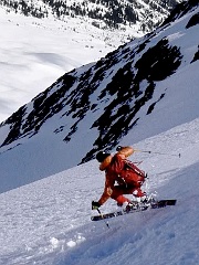 Sky Sjue skis the North Peak of Hozomeen. Photo © Drew Tabke.