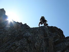 Gordy Skoog climbs the NE Rib of Repulse Peak. Photo © Crispin Prahl.